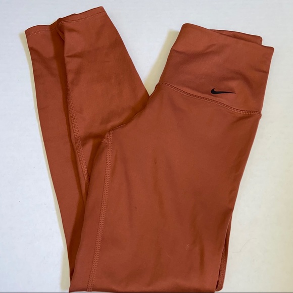 nike burnt orange leggings